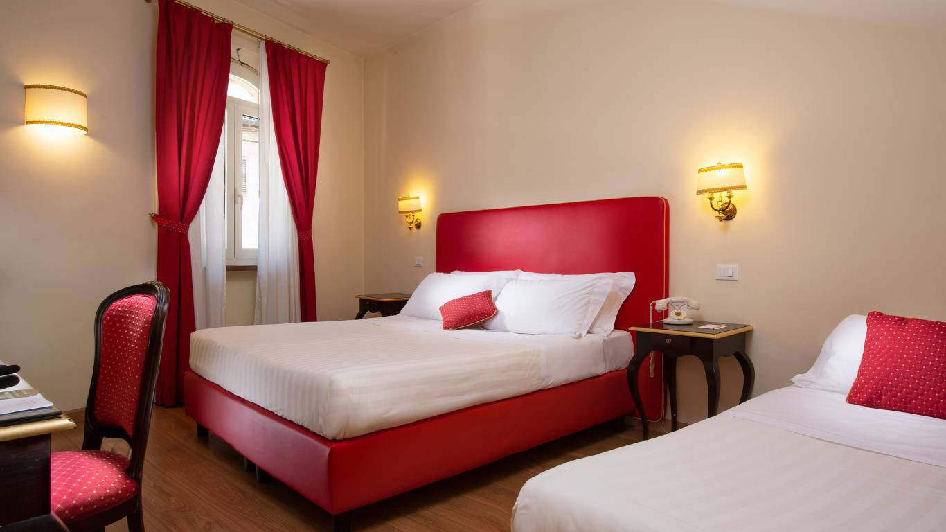 Hotel-Giotto-Assisisi-Deluxe-Room-Red-Bed