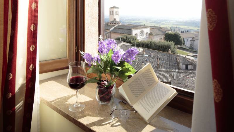 Hotel-Giotto-Assisisi-Room-window-wine-flowers-book